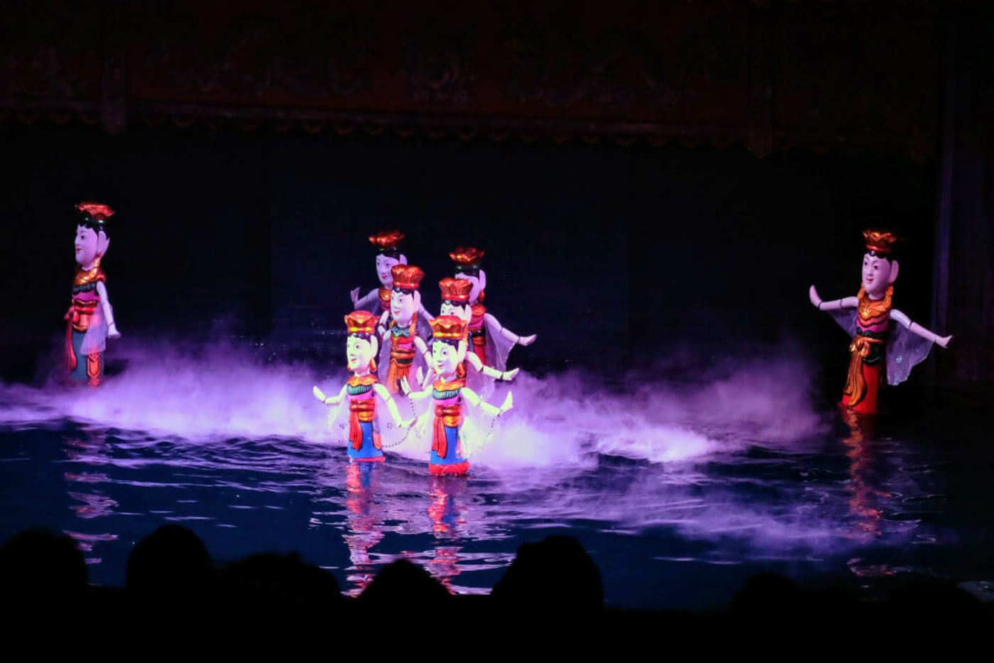 Watch a water puppet show