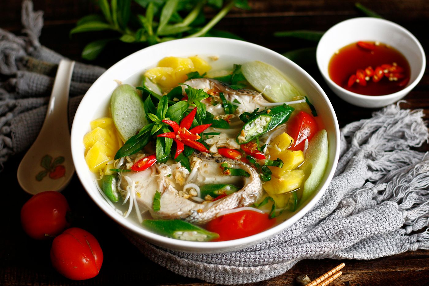 The delicious Sour Fish Soup with colorful vegetables. Photo by VN Express